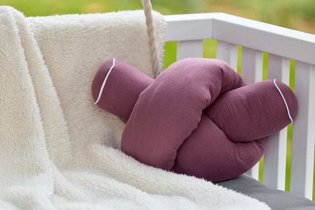 Purple muslin changing table border