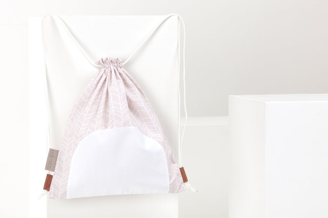 Sac de sport motif plume blanc sur rose