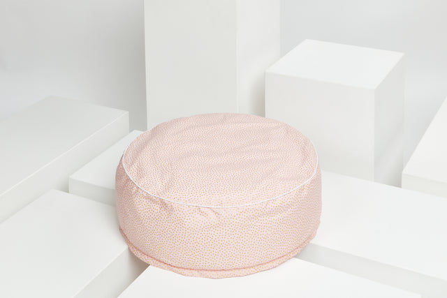 Pouf doré pois irréguliers sur rose