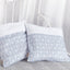 Housse de coussin flèches blanches sur gris