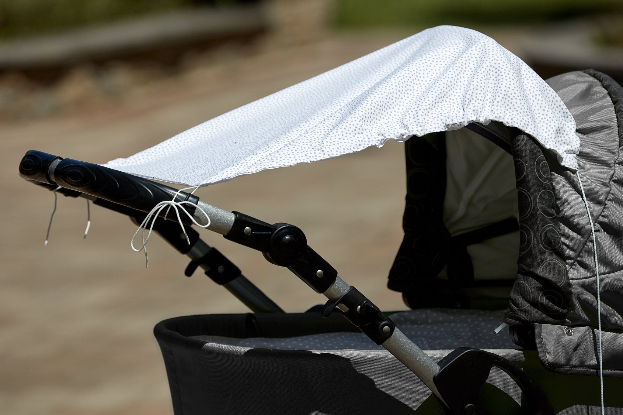 Sun sail gray irregular dots on white