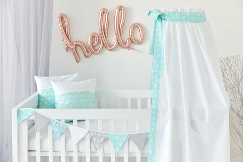 Bed canopy white arrows on mint