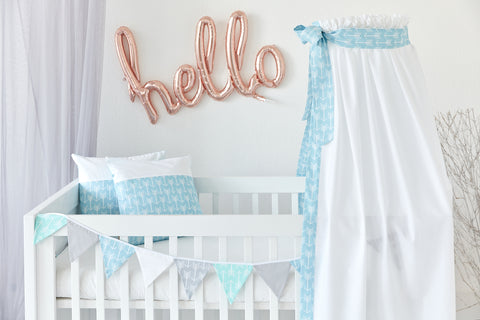 Bed canopy white arrows on blue