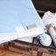 Matelas à langer de voyage pois blancs sur bleu clair