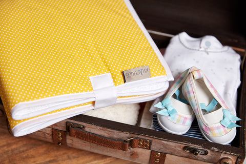 Travel changing pad white dots on yellow