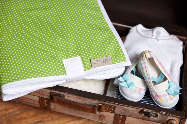 Travel changing pad white dots on green
