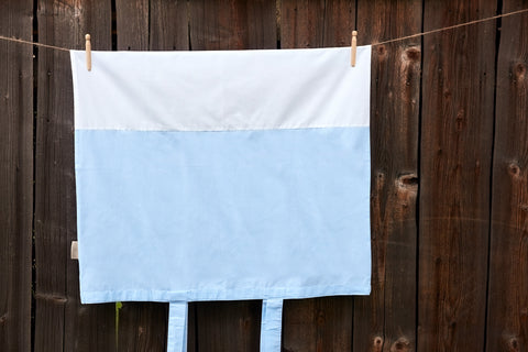 Cover for changing table mat white dots on light blue