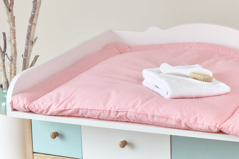 Matelas à langer pois blancs sur rose corail