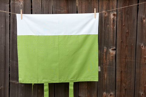 Cover for changing table mat white dots on green