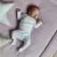 Tapis de jeu mousseline pois dorés sur rose