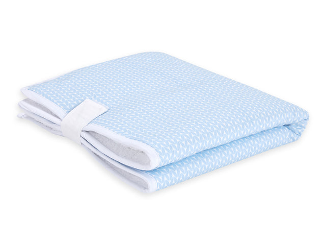 Travel changing pad, small leaves, light blue on white