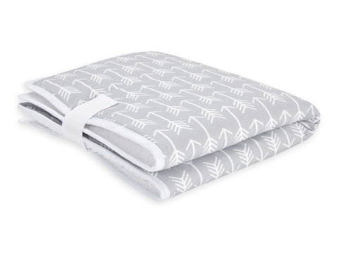 Travel changing pad white arrows on gray