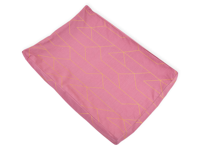 Cover for wedge changing pad gold lines on pink
