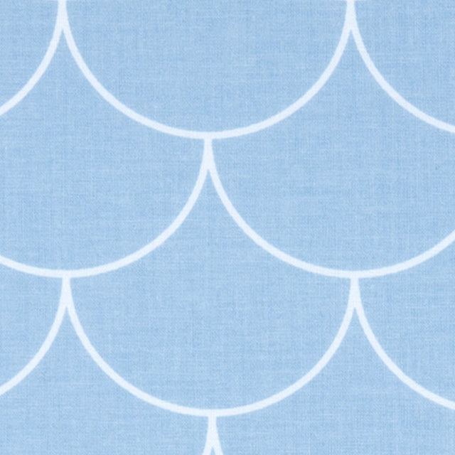 Tissu demi-cercles blancs sur bleu pastel
